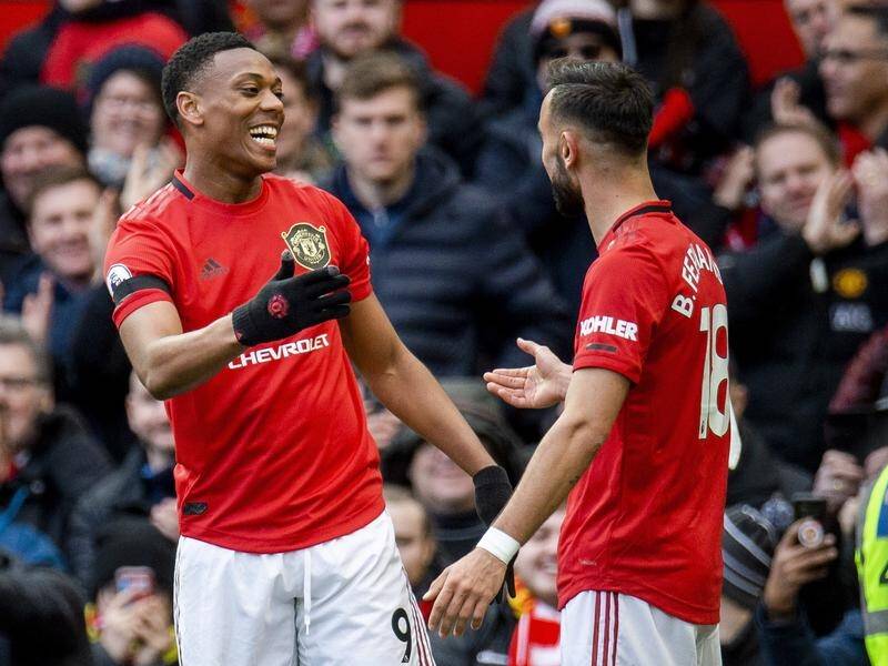 Anthony Martial (l) and Bruno Fernandes both scored in Manchester United's EPL win over Watford.