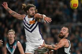 Ex-Demon Luke Jackson (left) is making a big impression in the ruck for the Dockers. (Michael Errey/AAP PHOTOS)
