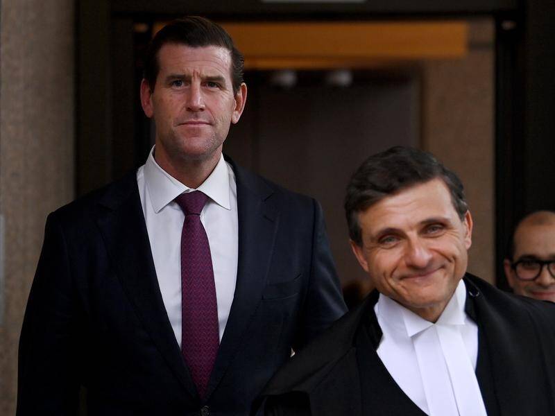 A witness for Ben Roberts-Smith (left) says he never said "we're going to blood the rookie".