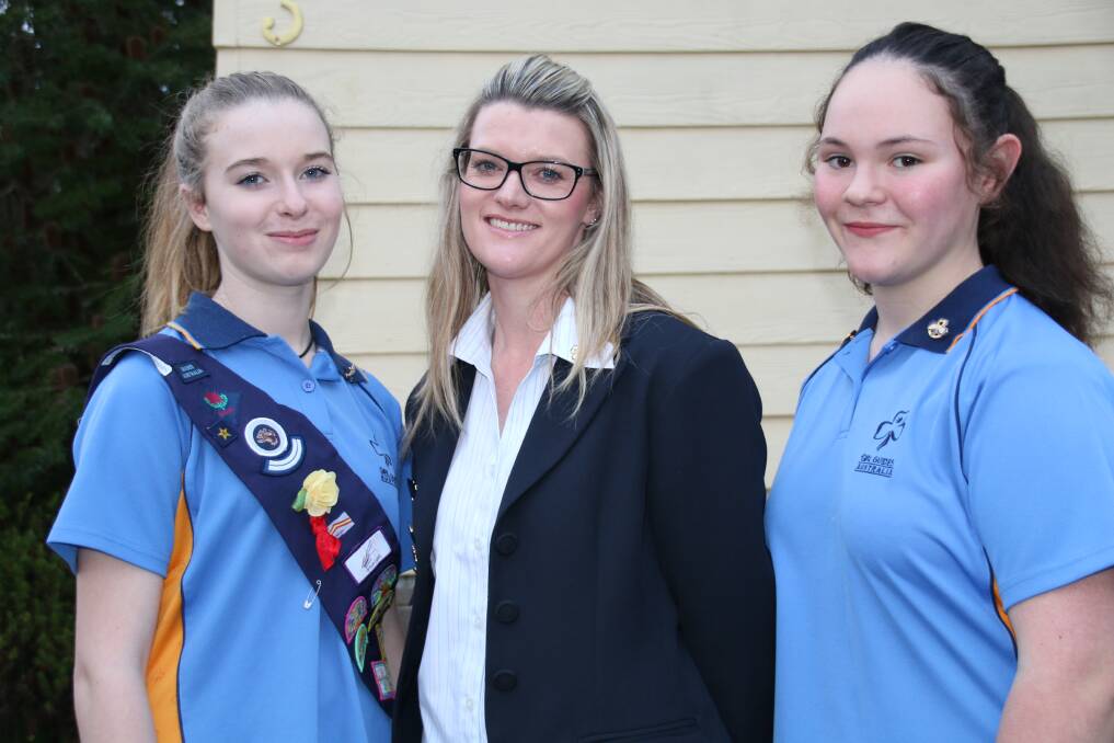 Moss Vale Girl Guides Amelia Brook and Taylor O'Brien have been selected for an international jamboree. Leader Lauren Brook will accompany the girls to the UK next year. Photo by Victoria Lee