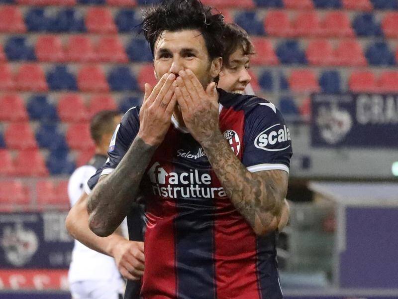Bologna's Roberto Soriano celebrates after scoring twice against Parma in their 4-1 win.