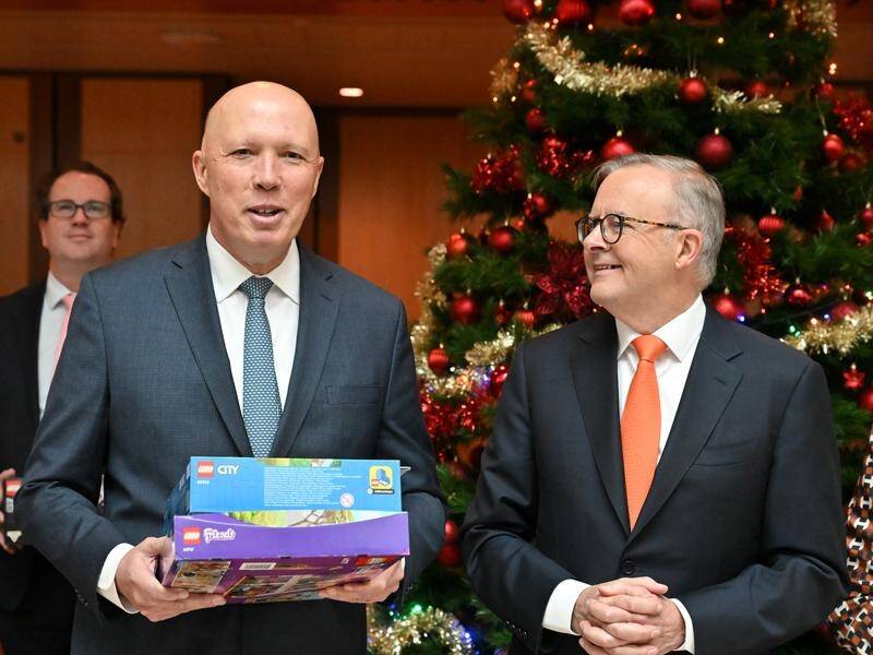 Peter Dutton and Anthony Albanese have wished Australians a Merry Christmas. (Mick Tsikas/AAP PHOTOS)