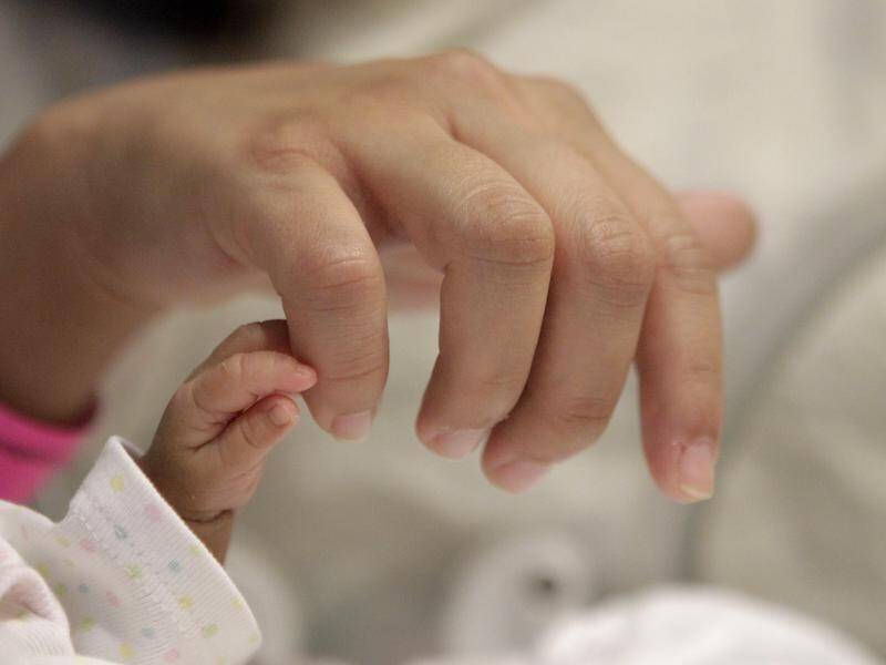 A Queensland baby's home water birth death was preventable, a coroner has found.
