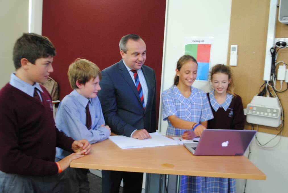 Local MP Jai Rowell visited a Year 7 TAS class at Chevalier College before the memorandum of understanding ceremony. 	Photo by Victoria Lee