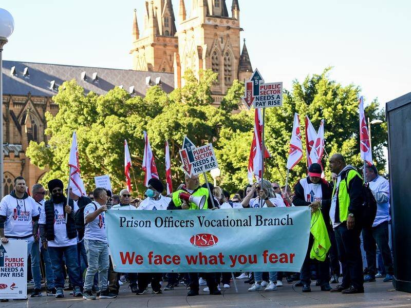Thousands of striking public service workers have marched outside the NSW parliament.