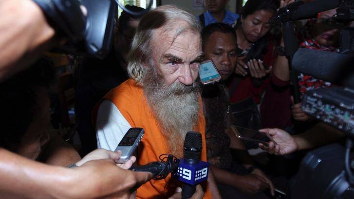 Accused Australian paedophile Robert Andrew Fiddes Ellis talks to reporters in a courtroom in Bali on Tuesday. Photo: AP Photo/Firdia Lisnawati