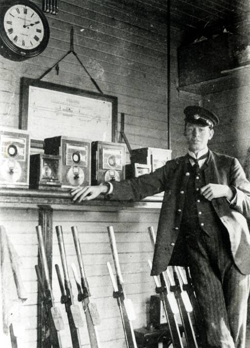 CONTROL ROOM: Colo Vale Stationmaster Frank Toupein pauses in signal box, 1915.