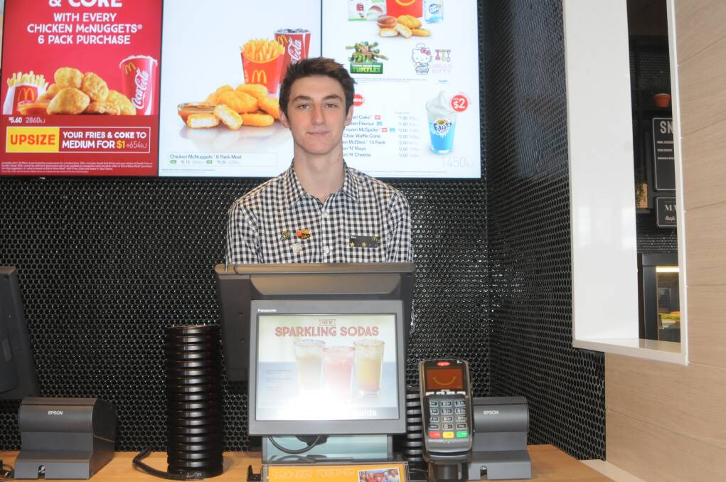 Max Ellis is ready to serve the customer.