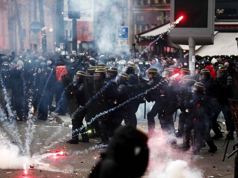 French riot police clashed with protesters during a demonstration against pension reforms in Paris.