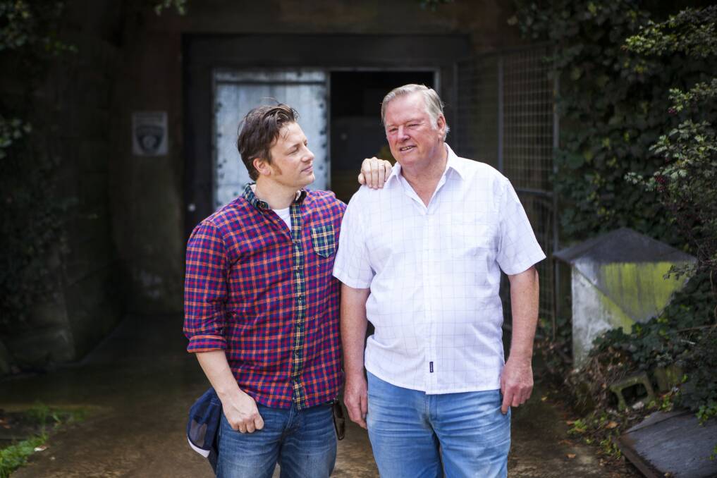 Jamie Oliver and Dr Noel Arrold outside the mushroom tunnel in Mittagong.	Photo: Destination NSW