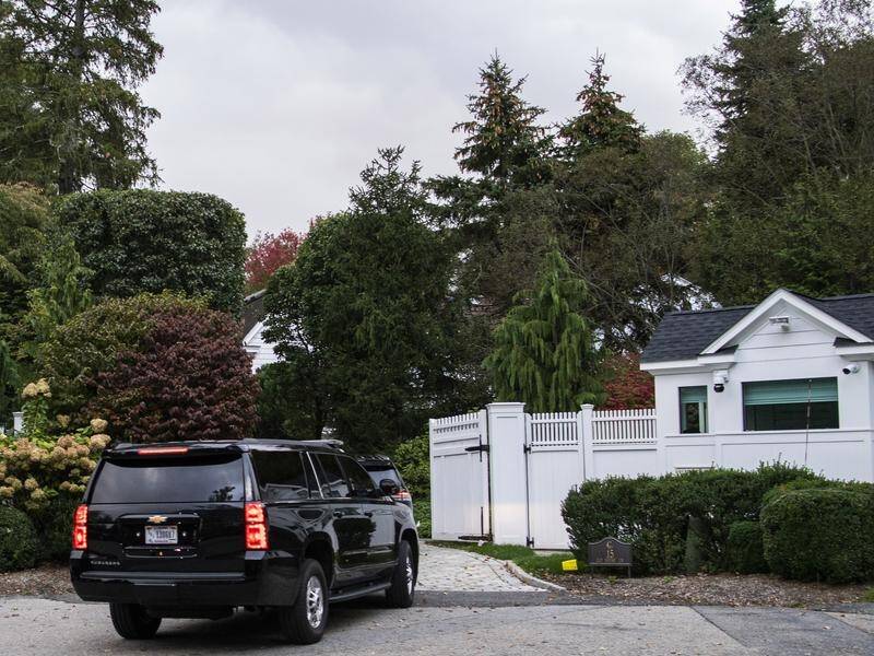 A motorcade returns former US president Bill Clinton home after a spell in hospital in California.
