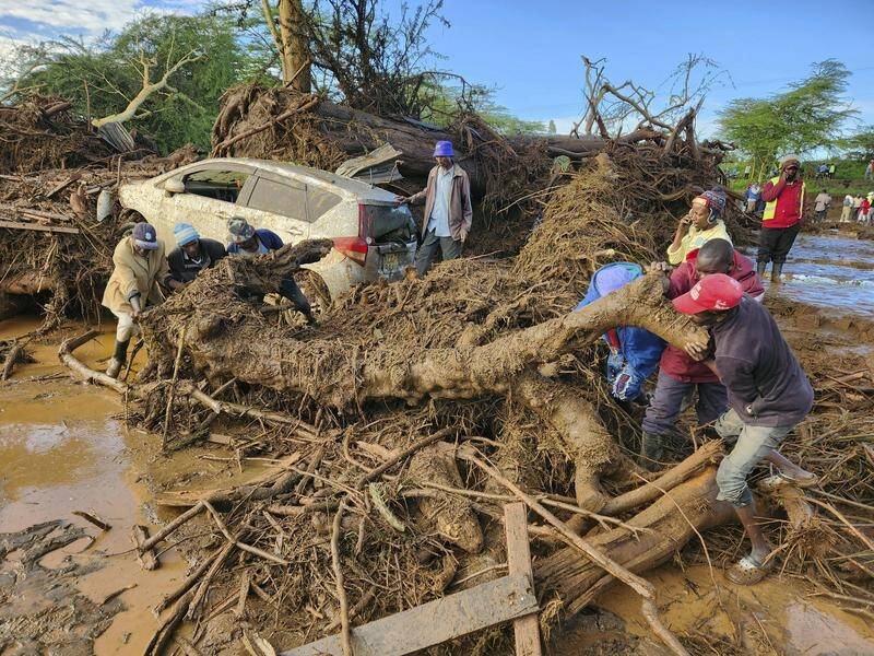 Police in Kenya say at least 42 people have died after a dam collapsed in the country's west. (AP PHOTO)