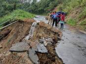 At least 11 people have been killed by heavy flooding and rains in northeast India.