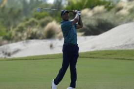 Tiger Woods was five shots better than his opening round but struggled late at the Hero Challenge. (AP PHOTO)