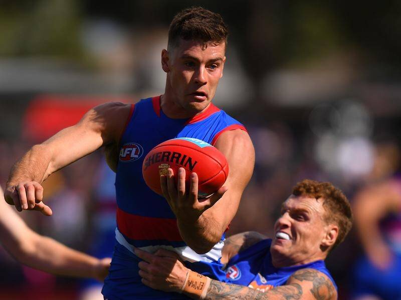 Josh Dunkley is one of nine Western Bulldogs 2016 premiership players in line for 2021 AFL honours.