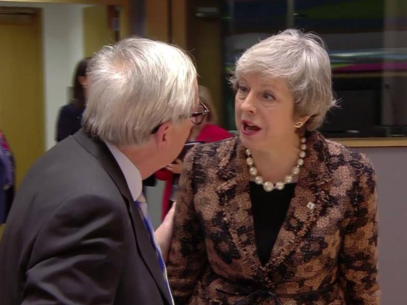 Theresa May says she had a 'robust' exchange with European Commission president Jean-Claude Juncker.