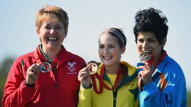 Elena Allen of Wales, Laura Coles of Australia and Andri Eleftheriou of Cyprus receive their medals after winning the Women's Skeet final at Barry Buddon Shooting Centre. Photo: Jeff J Mitchell/Getty Images
