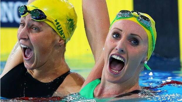 Taylor McKeown (R) of Australia celebrates winning the gold medal with silver medallist Sally Hunter. Photo: Getty Images
