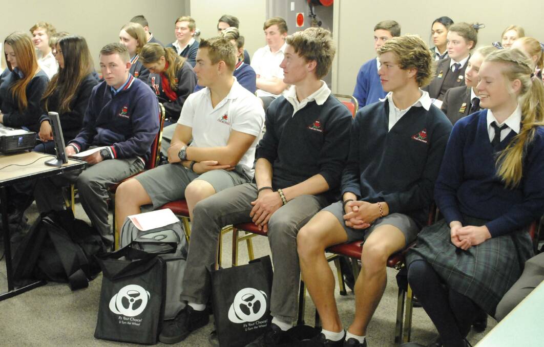 Year 11 students listen intently to Senior Constable Jason Cula's presentation at the U Turn The Wheel course.