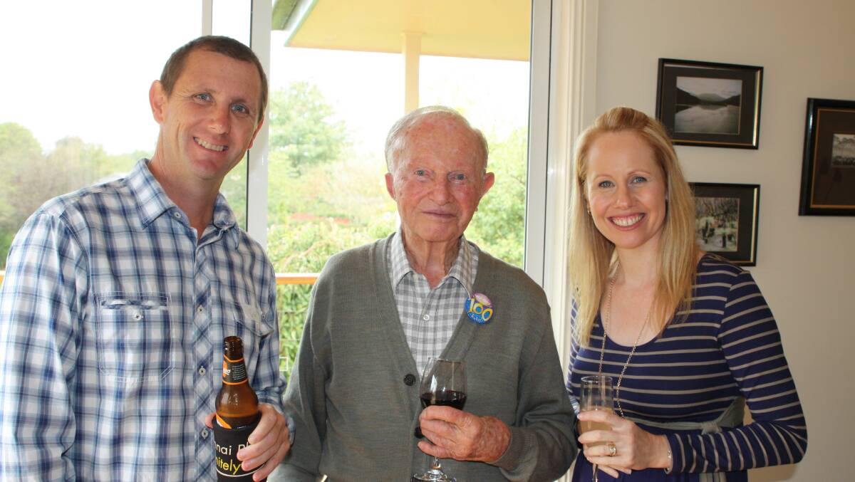Grant Burt and wife Kylie with Gordon on his 100th birthday. Photo supplied