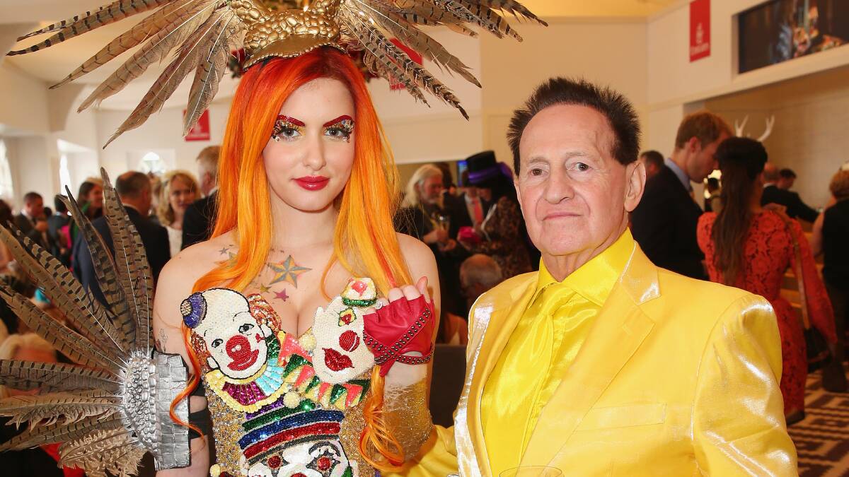 Geoffrey Edelsten (right) with model Gabi Grecko after he proposed to her on Melbourne Cup Day at Flemington in 2014. Picture: Getty Images