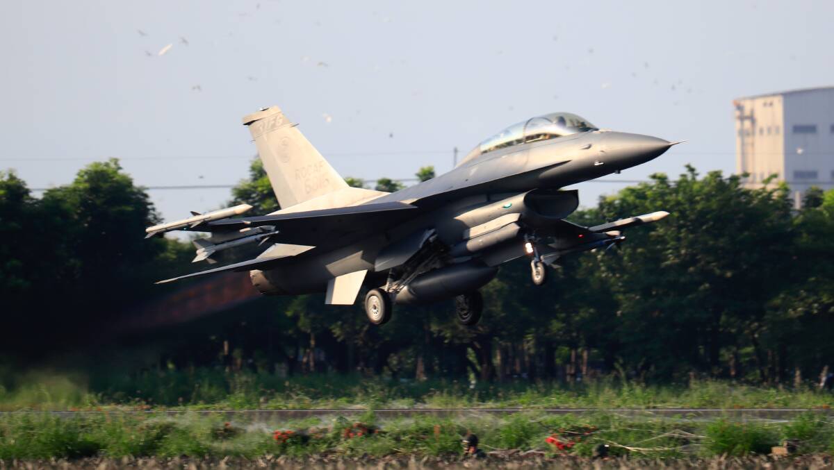 An F-16 fighter jet is deployed to conduct emergency landing and takeoff training during drills in Pingtun, Taiwan, on September 15. Picture: Getty Images
