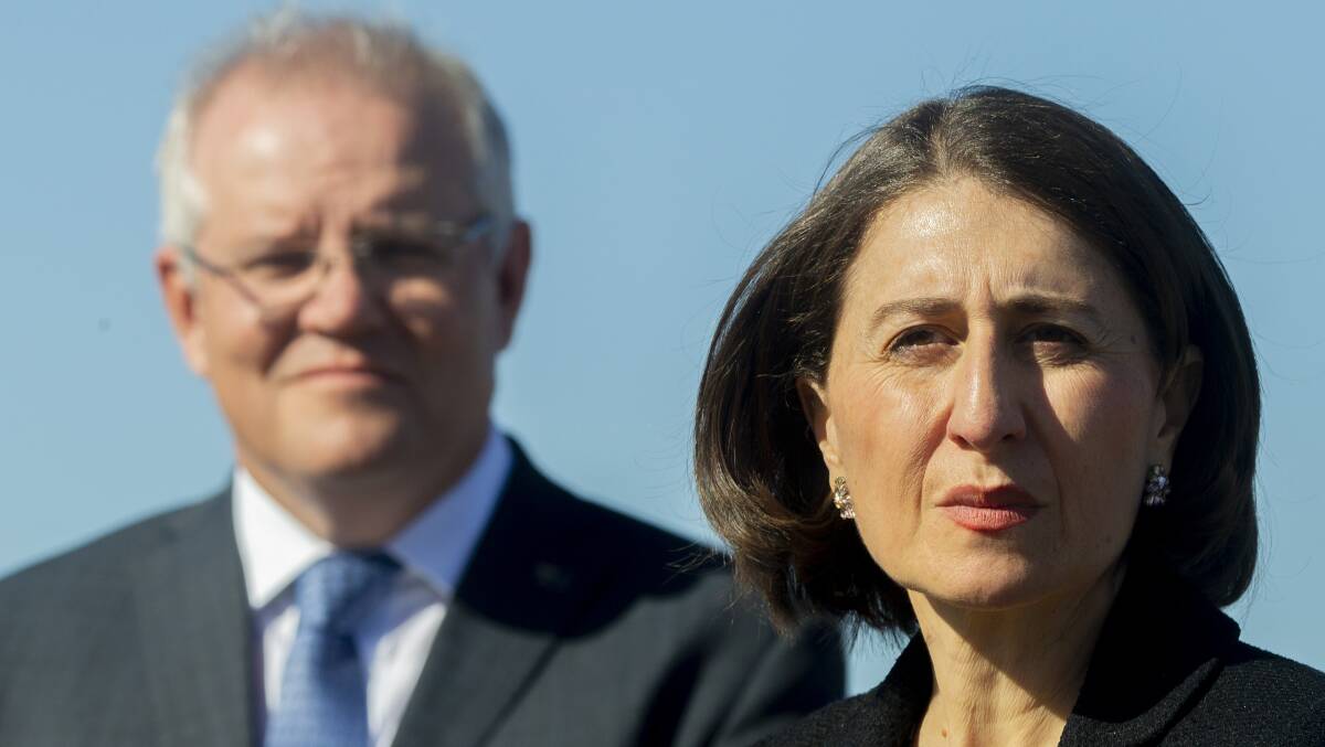 NSW Premier Gladys Berejiklian (right) on Friday announced she would resign from Parliament after news broke that she is being investigated by the NSW ICAC. Picture: Getty Images