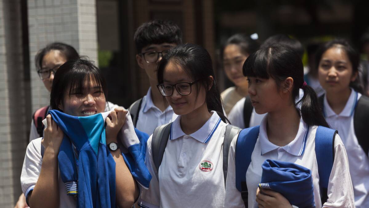 Students leaving school after China's national college entrance examinations. Picture: Shutterstock