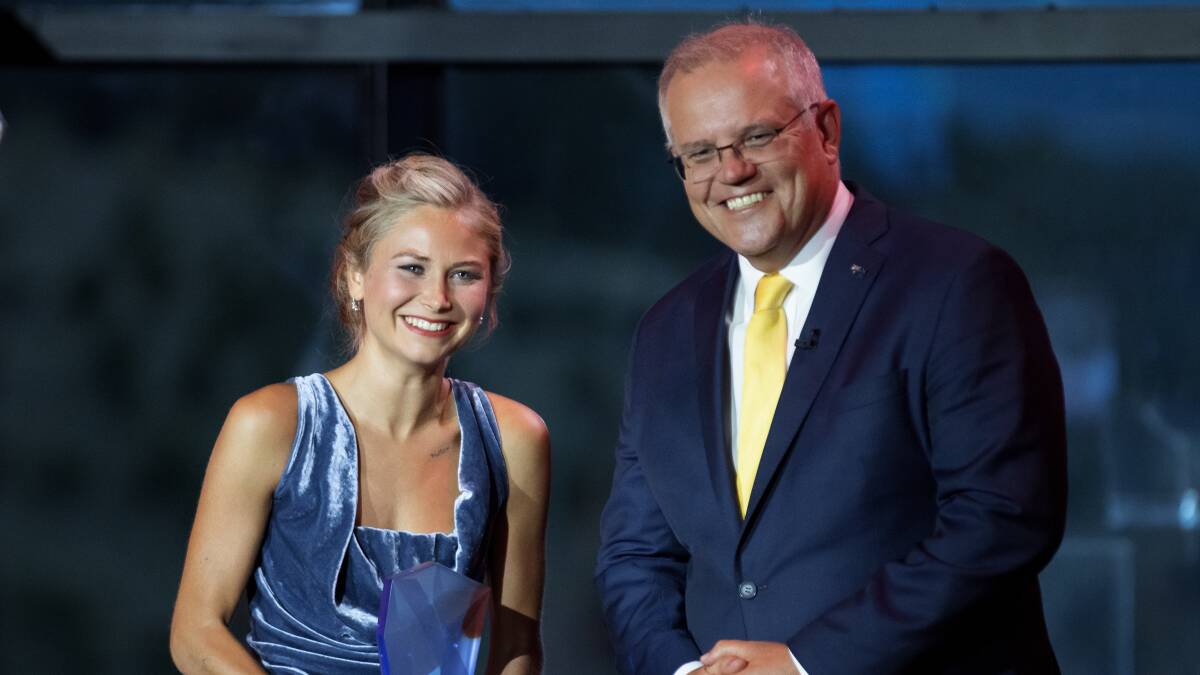 Australian of the Year Grace Tame with Prime Minister Scott Morrison. Picture: Sitthixay Ditthavong