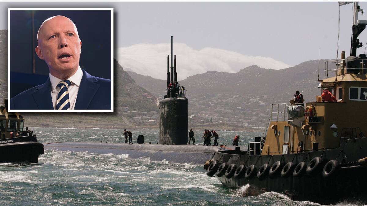 American navy submarine USS San Juan (SSN-751) docks at the Simonstown Naval Dockyard in Cape Town in 2009. Inset: Peter Dutton. Pictures: Getty Images, Keegan Carroll