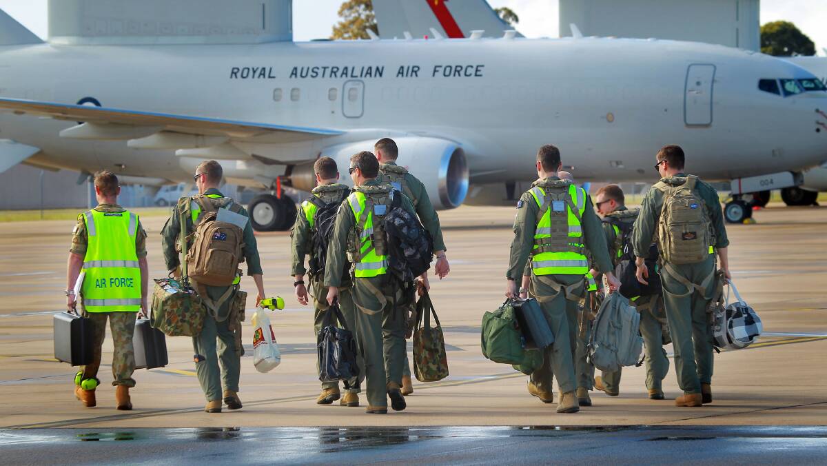 Australian air crew prepare to board an E-7A Wedgetail at Williamtown air base in 2014. Picture: Royal Australian Air Force