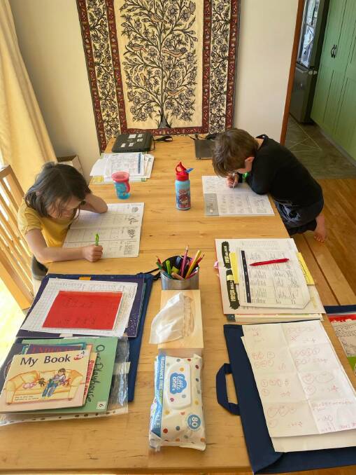Oliver and Abigail learning at home during the previous lockdown. Photo: Anne Smith. 