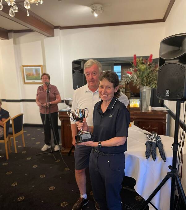 Club Captain Howard McMillan with Moss Vale Pro Am winner Karen Pearce. Picture supplied.
