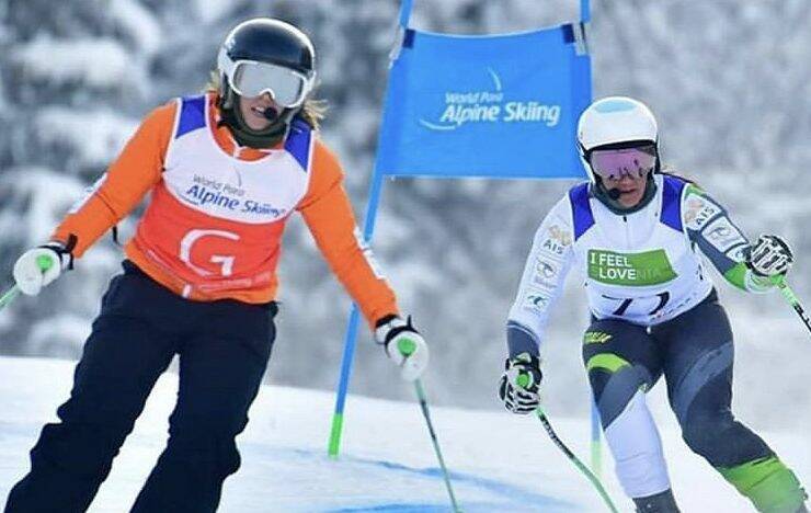 Team: Meliisa Perrine (right) and her sighted guide Bobbi Kelly competing during the World Para Alpine Skiing Championships in Slovenia. Photo: Australian Paralympic Committee