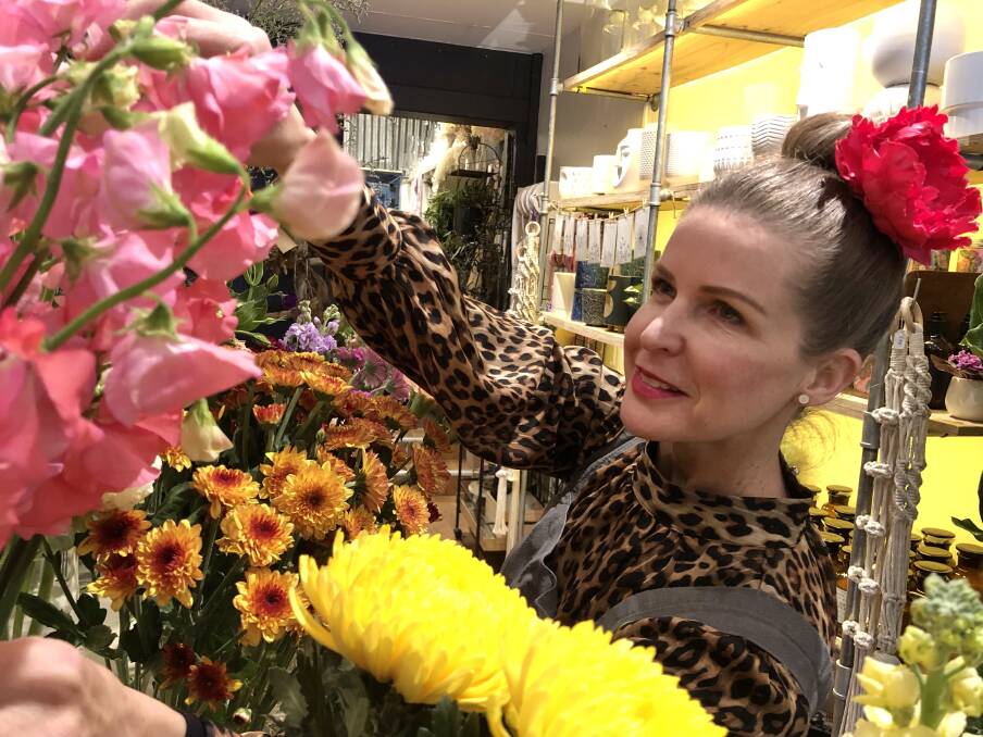 Change: Southern Highlands resident Selina Dickson pictured gained hands-on experience at Flowers on Argyle, before using a TAFE NSW qualification to switch careers from flight attendant to florist. Photo: supplied. 