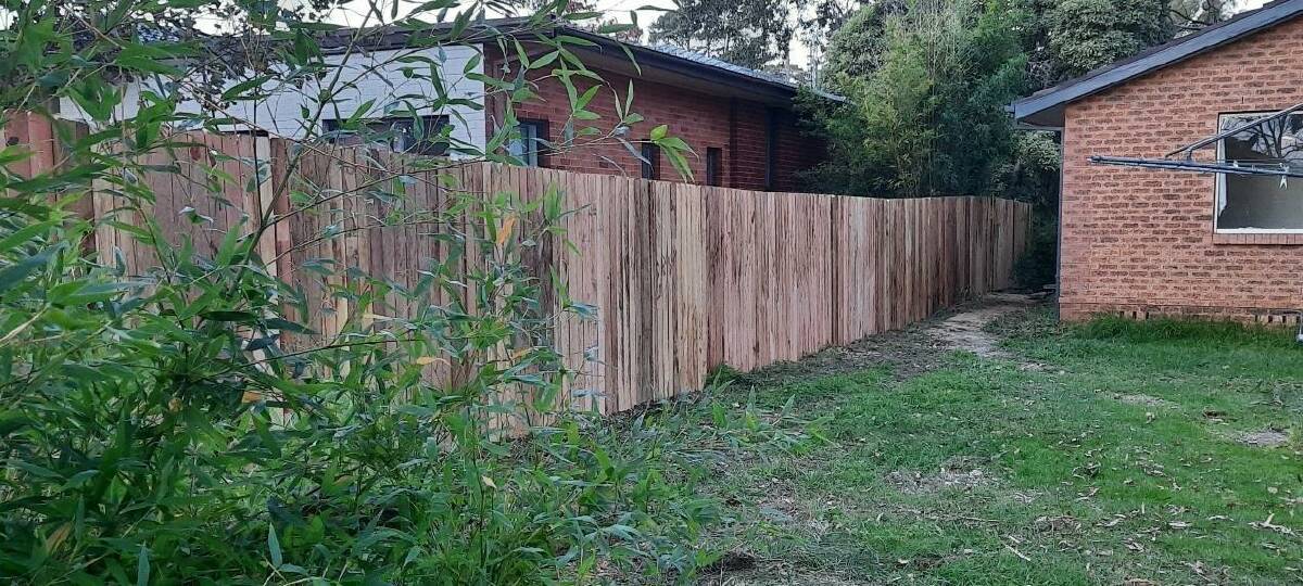 Fence work completed in a social housing property in Bowral. Photo: Supplied.