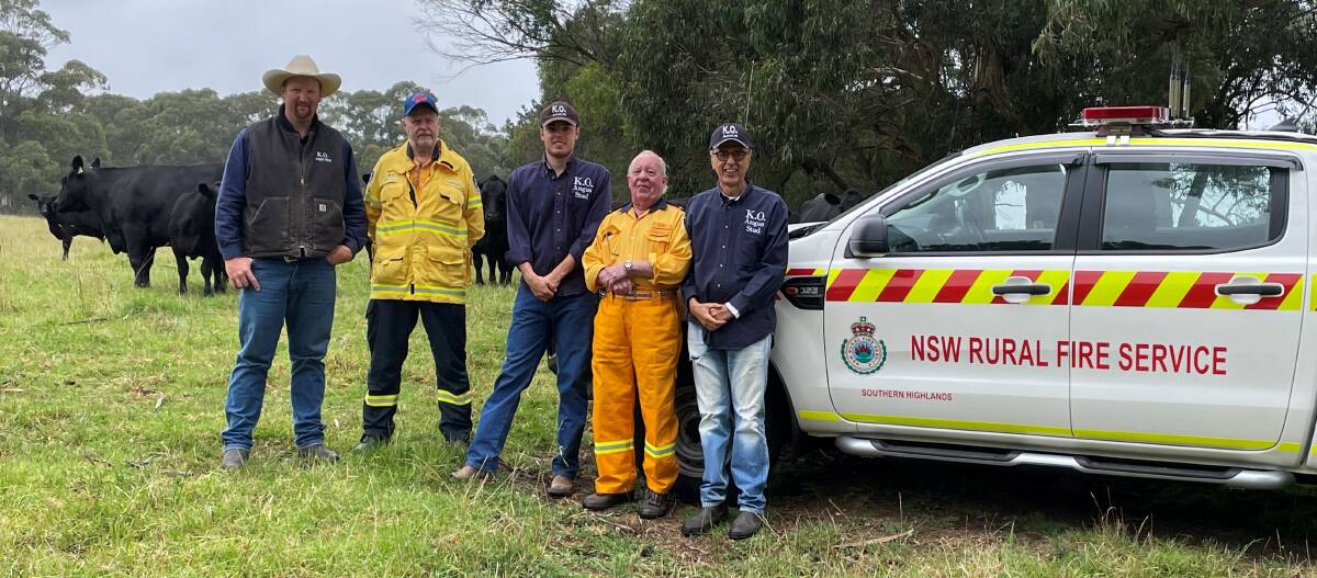 Tim Lord of KO Angus with NSW RFS member David Brown, Angus Onisforou of KO, fellow NSW RFS representative Gary Dover and Theo Onisforou with the new vehicle donated to the Robertson branch. Photo: Supplied 