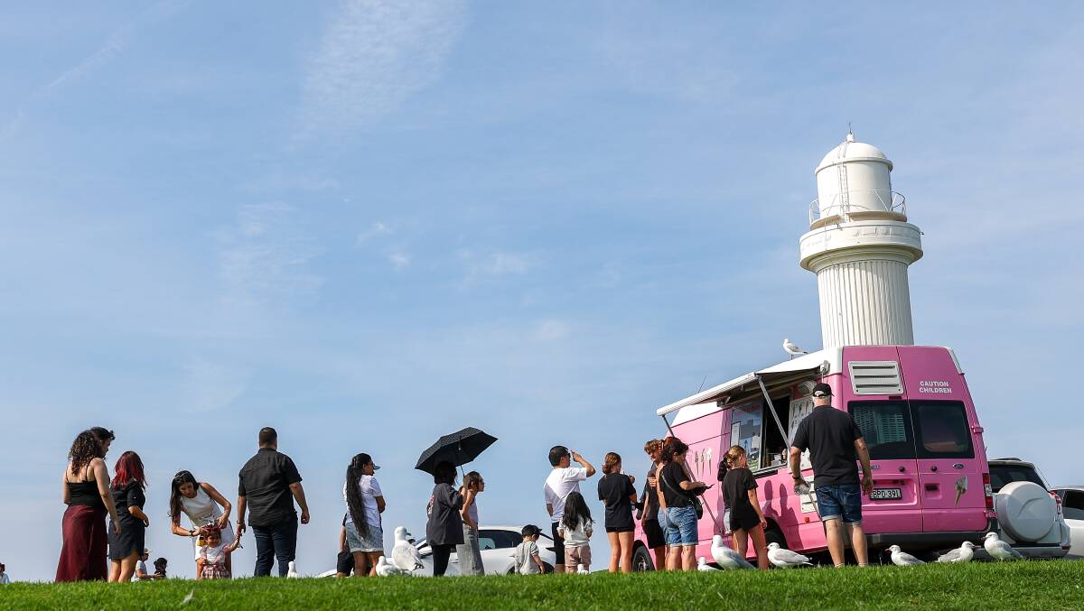 Queues of people were lining up to get an ice cream at City Beach in Wollongong on a recent Sunday afternoon. Picture by Adam McLean