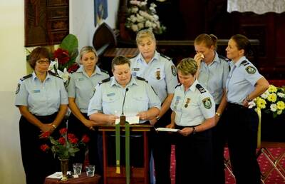 Colleagues of Sgt Longford, led by Senior Constable Natalie Innes, speaking at the funeral service on Friday. Photo by Jeff de Pasquale