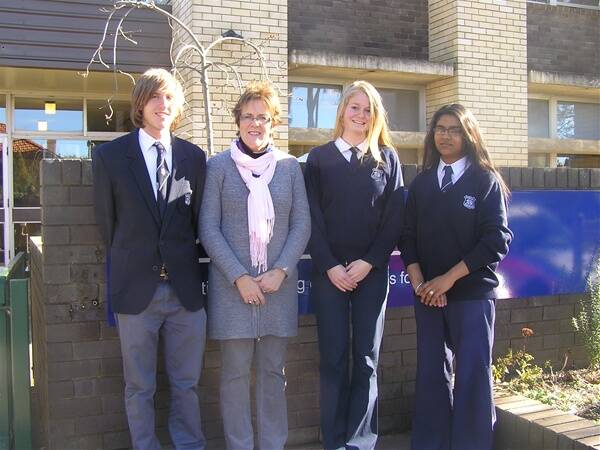 MEET AND GREET: Kim Paviour gets to know some of Bowral High Schools senior students. From left: David Webb, school captain Jessica Dunn and Priye Kaur.