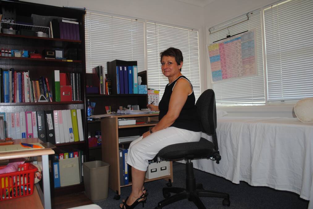 Nilva van Zeyl in her Moss Vale office. Photo by Megan Drapalski