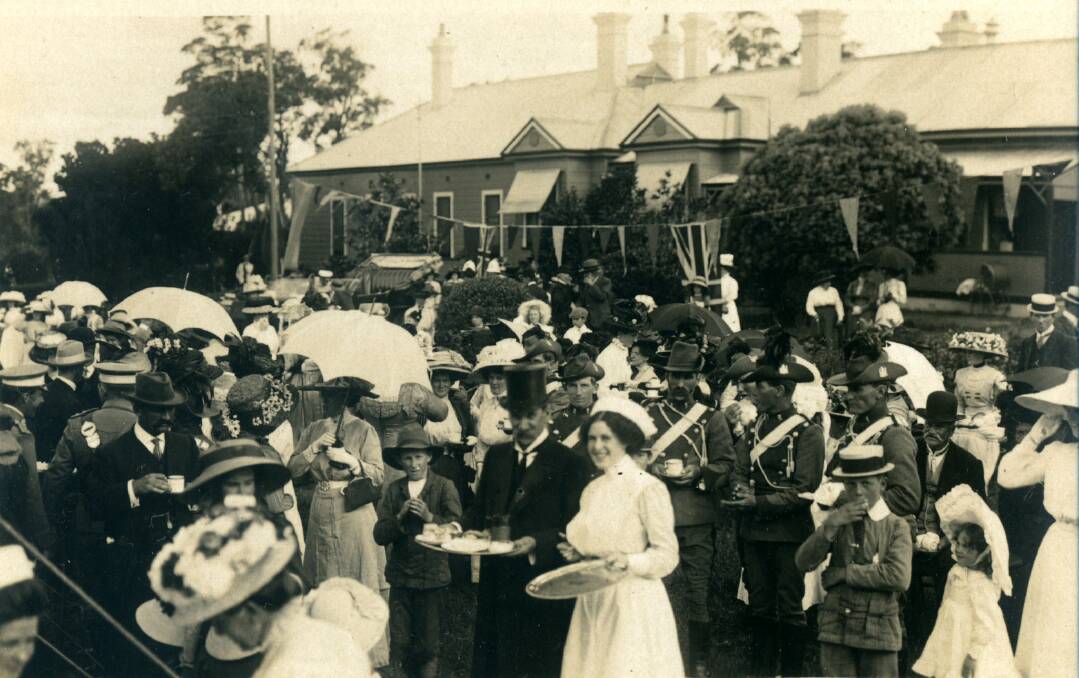 CONVIVIAL: Attendees mingle at afternoon tea on the hospital lawns after the official ceremony.