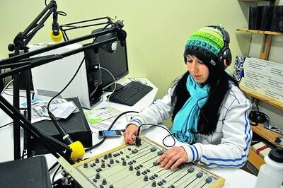Katie Grazhdannikova, one of the eight presenters at Youth Radio station 2WYR, 92.5FM presenting her program, Euro Plus.