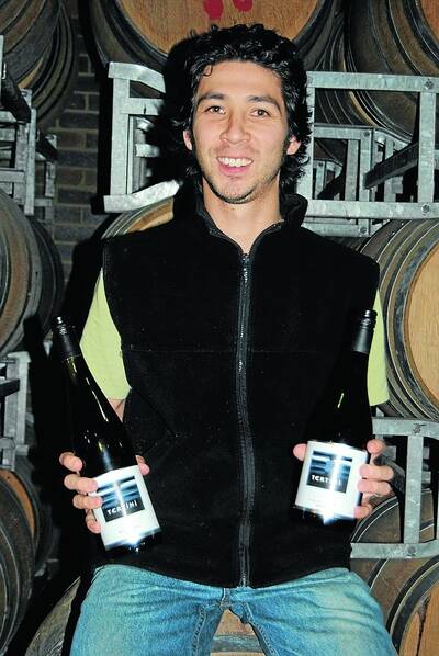 Winemaker Jonathon Holgate proundly shows off two of the award-winning Tertini wines.Photo Linda Lambrechts