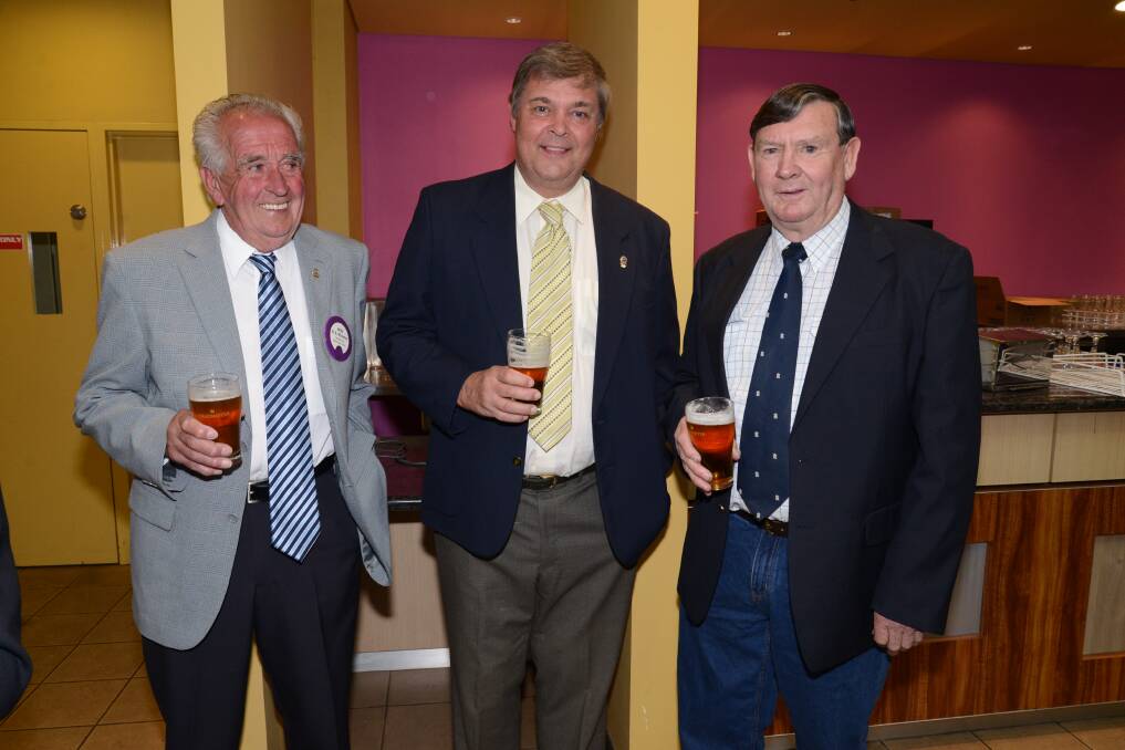 Bob Wheatley, Roger McAndrew and John Keith enjoying some refreshments before the function started.