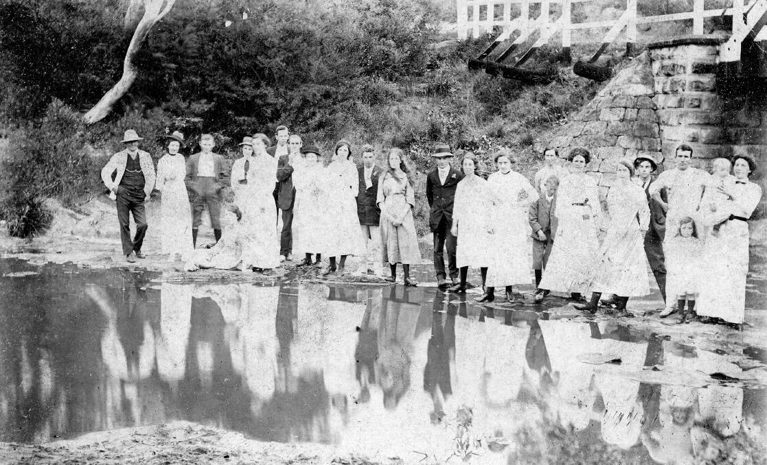 RECREATION: A group in the 1920s enjoying Fitzroy Falls, now part of Morton National Park.	Photos: BDH&FHS