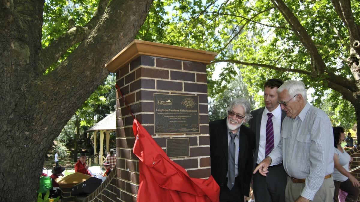 Larry Whipper, Stephen Jones and John leighton Jones unveil the Leighton Gardens refurbishment plaque. Photo by Megan Drapalski