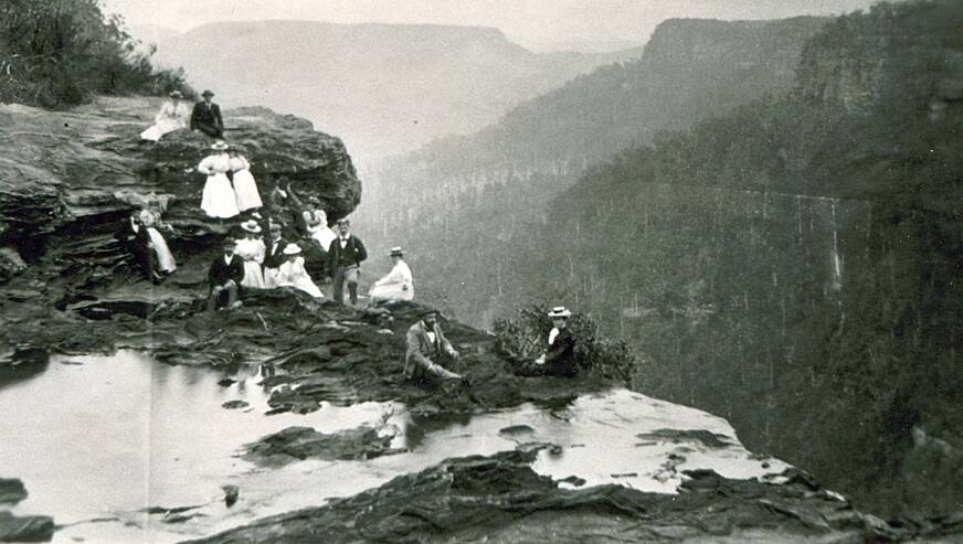 ON EDGE (above): In early days, visitors at Fitzroy Falls certainly had a breath-taking experience!